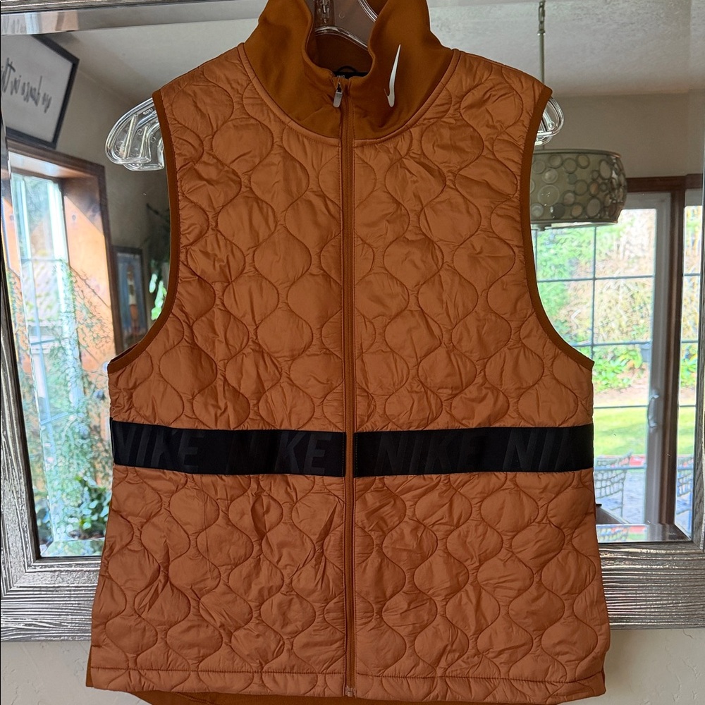 Nike Quilted Vest in Orange with Black Detail running hiking outdoor aero layer